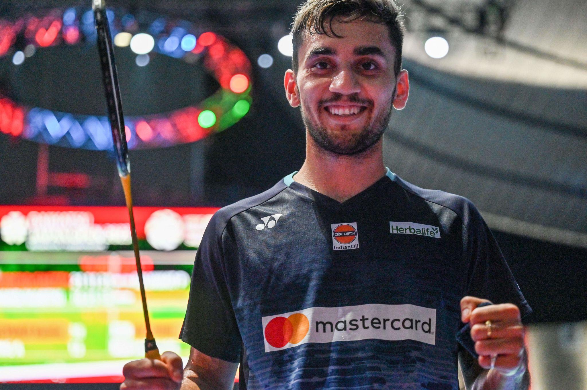 Lakshya Sen Indian badminton player smash action badminton court international tournament