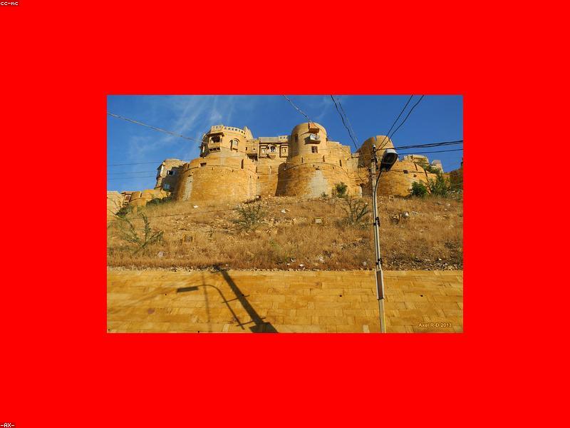 Jaisalmer Fort glowing gold in the sunset over the desert