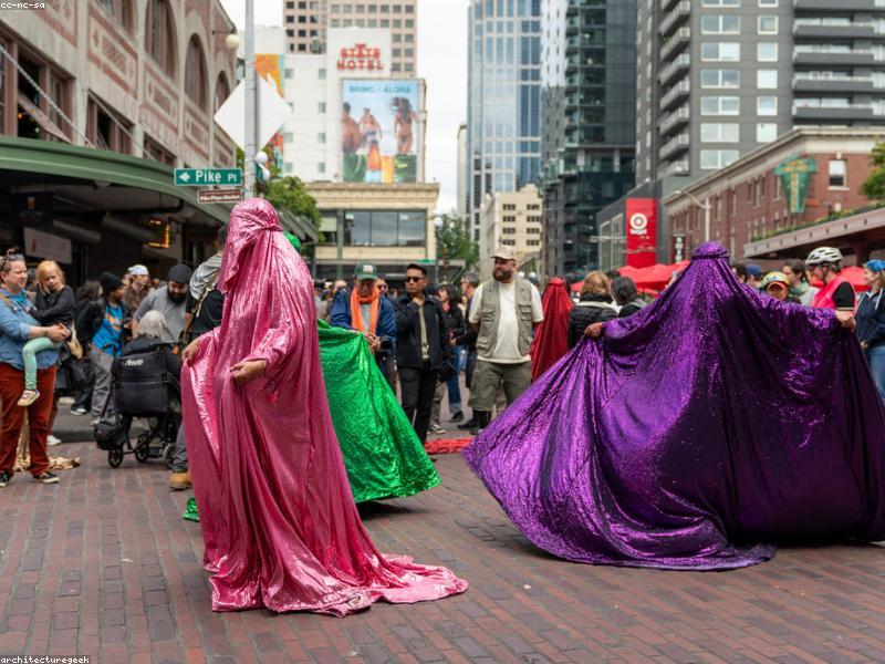Couple exploring Pike Place Market with fresh flowers and produce