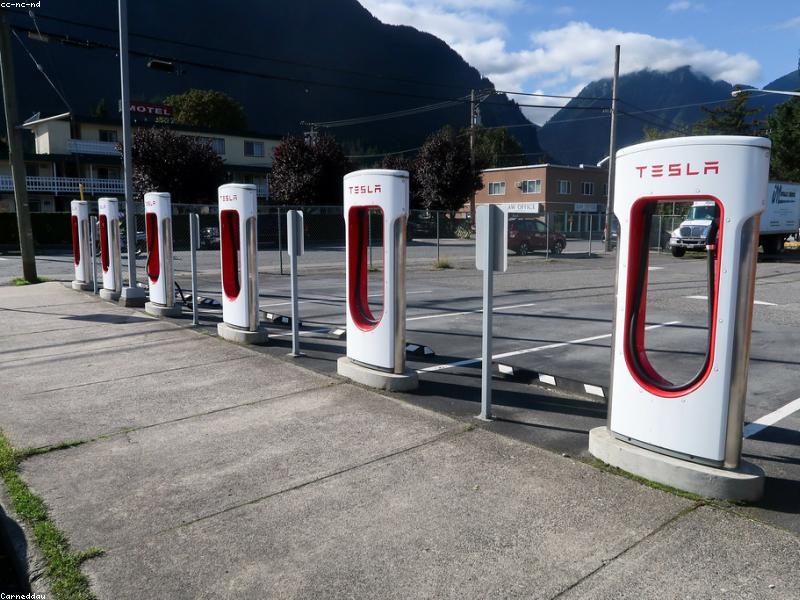 Electric car charging at a station